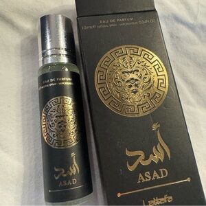 Lattafa Yara Asad Fragrance Mist unisex black and gold